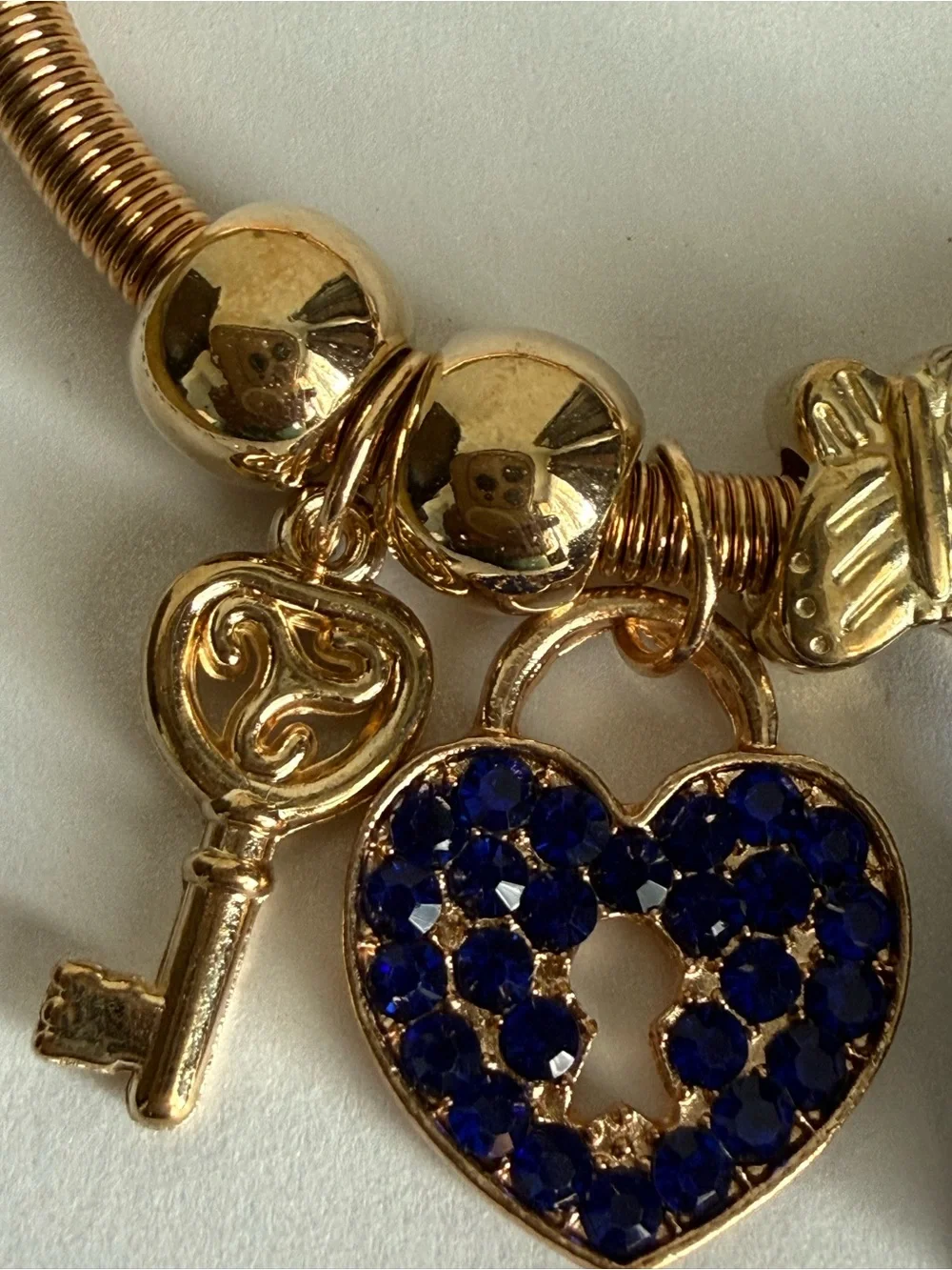 Gold Heart Charm Bracelet with Navy Blue Tassel